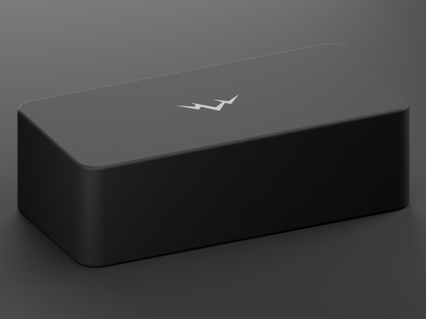 Rear three-quarter view of the NOMAE enclosure, the blank end with no opening facing the camera